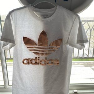 a rose gold adidas tshirt